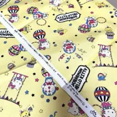 ドラえもん ハローキティ コラボ　綿イエロー　はぎれ