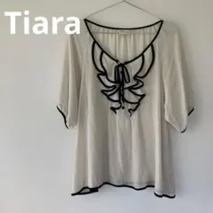 Tiara ティアラ パイピングシアーブラウス フロントフリル 半袖 ホワイト