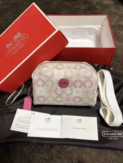 【新品・未使用】COACH コーチ オプアート フラワー ピンク　ポーチ