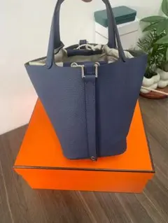 COACH マンハッタンペブルレザーカモフラージュ バツクパック - メルカリ