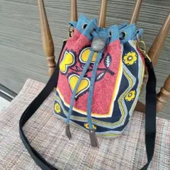 ハンドメイド　アフリカンバティック×デニム　巾着ショルダーバッグ　コンチョつき