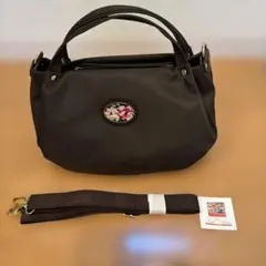 レイクアルスター茶色のナイロンハンドバッグ 花の刺繍付き