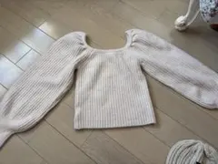 リブ編みクリーム色セーター