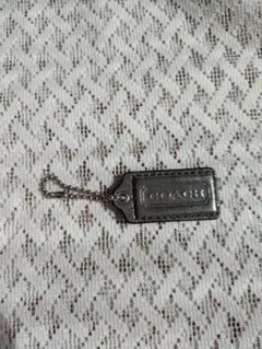 COACH レザー タグ型キーホルダー グレー