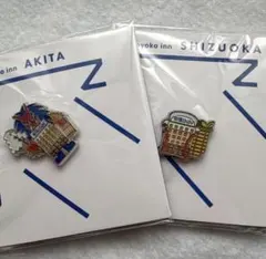 東横イン 40周年記念 ピンバッジ 2種セット - メルカリ