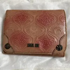 ANNA SUI 二つ折り財布 花柄型押しのサムネイル