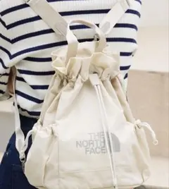 THE NORTH FACE 巾着型バックパック ホワイトのサムネイル