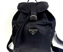 PRADA プラダ 巾着ミニリュック ブラック ナイロン 三角ロゴプレート