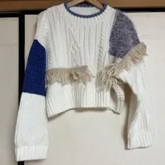 フリンジ付きケーブル編みニットセーター