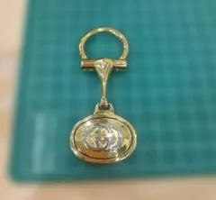 良品 グッチ キーホルダー GGマーク ゴールドカラーのサムネイル