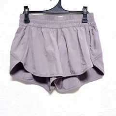 ルルレモン ショートパンツ 無地 8 紫 ライクラ 裾フレア ランニング 古着のサムネイル