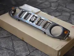 スズキ ジムニーノマド JC73 純正フロントグリル 新車外し品 973
