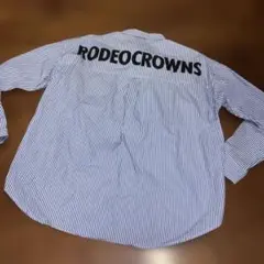 ロデオ　クラウンズ　OLバックロゴストライプビッグシャツ　ブルーのサムネイル