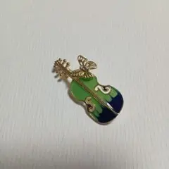 バイオリンと蝶のブローチ