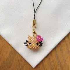 日焼けキティ　ビーズ　ストラップ　チャーム　ハワイ　キラキラ　プチギフト　キティ