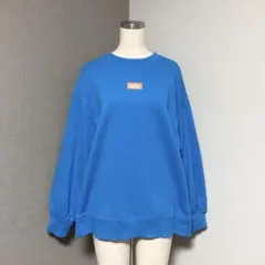 アースミュージックアンドエコロジー ファンタ オレンジ スウェット トレーナーのサムネイル