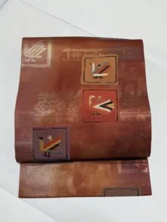 幾何学模様 赤茶色 名古屋帯　九寸