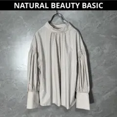 ナチュラルビューティーベーシック シャーリング ハイネック ブラウス S