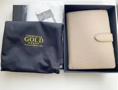 【新品未使用】　COCOCELUX GOLD カードケース COCOCELUX GOLD ﾍﾗｸﾚｽGOLDGOLDシュリンクﾛﾝｸﾞｳｫﾚｯﾄ ﾌﾗｸﾞﾒﾝﾄｹｰｽ
