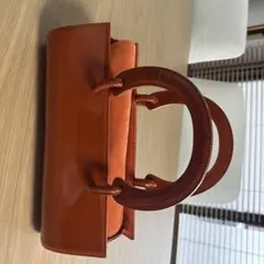 銀座カネマツ　　オレンジレザー ハンドバッグ リボン付き