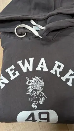 Champion NEWARK 49 FOOTBALL パーカー
