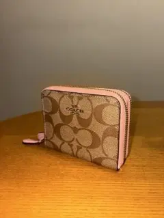 COACH 二つ折り財布 ピンク シグネチャー - メルカリ