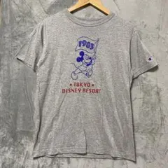 【L1433】 Champion ディズニーTシャツ サイズM グレーのサムネイル