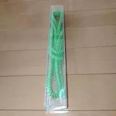 明るい緑色の編み込み帯締め