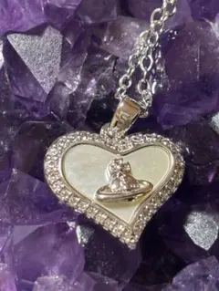 ハート型に土星ペンダントネックレス　ステンレス