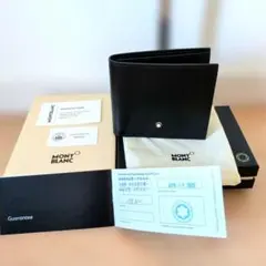 新品 MONTBLANC モンブラン ブラック 本革二つ折り財布 保証書付きのサムネイル