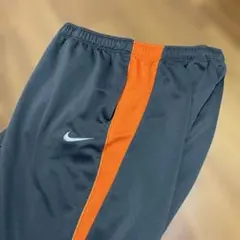 Nike ジャージパンツ グレー/オレンジ