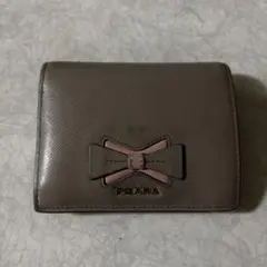 PRADA 二つ折り財布 リボン サフィアーノレザーのサムネイル