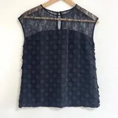 グレースコンチネンタルのグリーン×黒リボンパフスリーブブラウス 