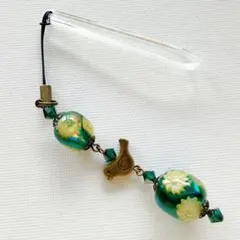 とんぼ玉帯飾り。とんぼ玉ストラップ。ティール色にダイクロ箔と花のとんぼ玉。