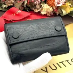 ルイヴィトン モノグラムシャドウ ディスカバリー コンパクト ウォレット 折財布のサムネイル