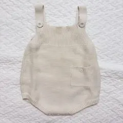 バースデイ mamaraku アイボリー ニットロンパース ボタン付き