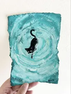 渦の中の黒猫の絵画