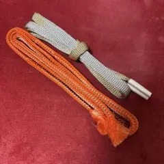 オレンジとシルバーの帯締め