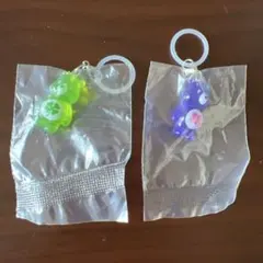 ケアベア　クリアマスコットチャーム2 めじるしアクセサリー　紫　緑　セット