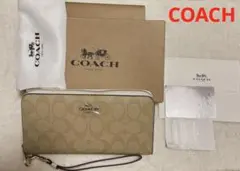 【コーチ】長財布 レディース メンズ ラウンドファスナー 革 ストラップ付き