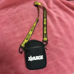 XARGE ショルダーバッグ CAUTIONプリント - メルカリ
