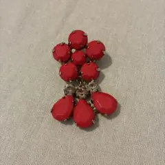 ブローチ　朱色　マリークワント？