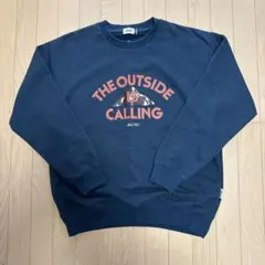 COLEMAN（コールマン）別注プリント裏毛クルーネックスウェット23AW XL