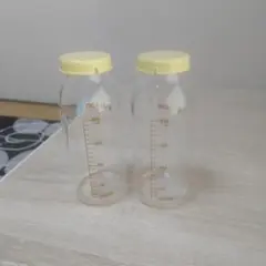ゆ*こ様 母乳実感産院用 哺乳瓶×2と黄色蓋2