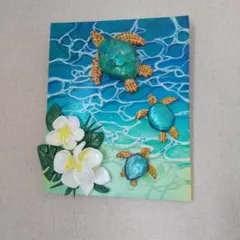 ウミガメと花の立体アート作品