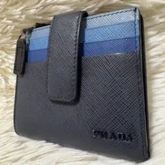 【美品✨】PRADA コンパクトウォレット サフィアーノレザー スナップボタンのサムネイル