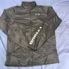 OAKLEY(オークリー)ブラックxゴールド 薄手トラックジャケット