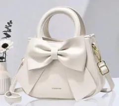 リボン付きホワイトショルダーバッグ