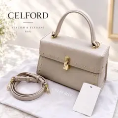 CELFORD リュタン ビジュースタッズポシェット サックス - メルカリ