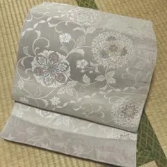 西陣織九寸帯未仕立品 （株）弥栄織物　薄鼠藤色ニ段ぼかし華文更紗　 芯入仕立代込